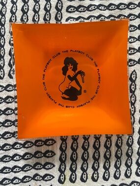 PLAYBOY Orange trinket dish or ashtray with Black Playboy Club Graphic
